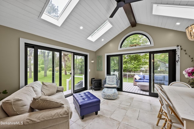 4 Woodlawn Dr, Williamstown, MA 01267 - living area featuring a skylight, a wood stove, healthy amount of natural light, recessed lighting, and high vaulted ceiling