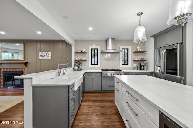 4 Woodlawn Dr, Williamstown, MA 01267 - kitchen with gray cabinetry, wall chimney exhaust hood, appliances with stainless steel finishes, open shelves, and recessed lighting