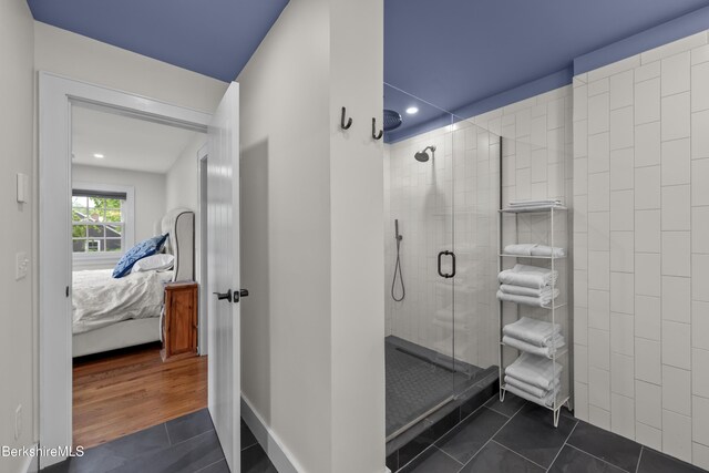 4 Woodlawn Dr, Williamstown, MA 01267 - ensuite bathroom featuring tile patterned flooring, a stall shower, and recessed lighting