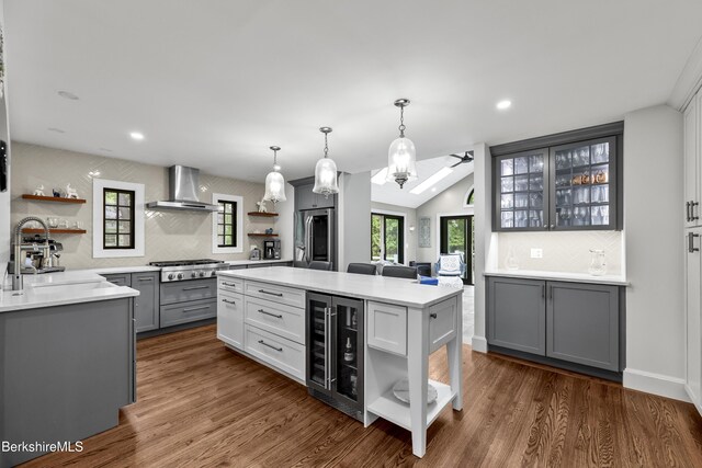 4 Woodlawn Dr, Williamstown, MA 01267 - kitchen with open shelves, wall chimney exhaust hood, beverage cooler, a sink, and appliances with stainless steel finishes