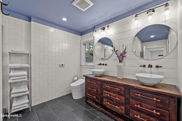 4 Woodlawn Dr, Williamstown, MA 01267 - full bathroom featuring tile walls, toilet, walk in shower, and double vanity