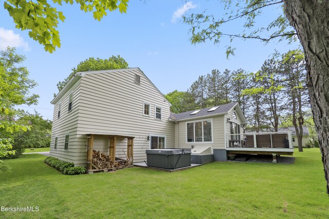 4 Woodlawn Dr, Williamstown, MA 01267 - rear view of property with a hot tub, a wooden deck, and a yard