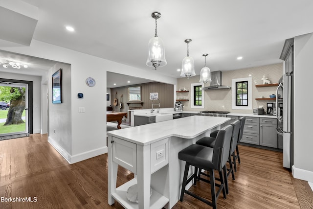 4 Woodlawn Dr, Williamstown, MA 01267 - kitchen with wall chimney range hood, open shelves, gray cabinetry, light countertops, and recessed lighting