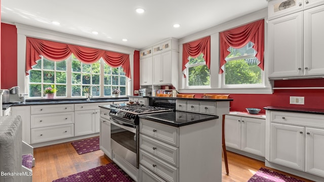 2 Melrose St, Adams, MA 01220 - kitchen with gas stove, plenty of natural light, light wood-style flooring, white cabinetry, and recessed lighting