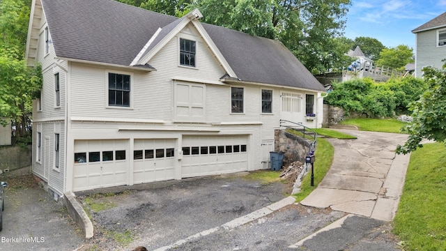 2 Melrose St, Adams, MA 01220 - view of front of property featuring a shingled roof and a garage