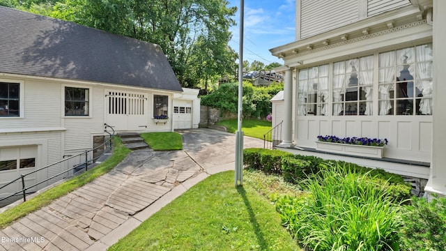 2 Melrose St, Adams, MA 01220 - view of yard featuring a garage and driveway