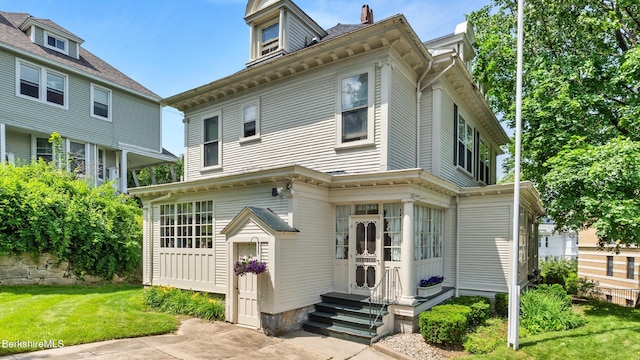2 Melrose St, Adams, MA 01220 - view of front facade with a chimney, entry steps, and a front lawn