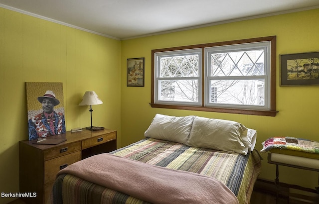 bedroom with crown molding