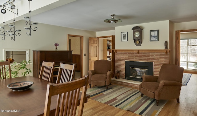 interior space with a fireplace and light hardwood / wood-style floors