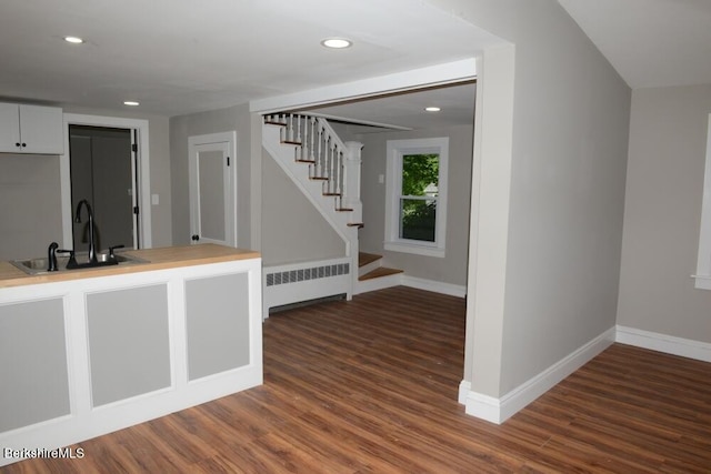 26 Davis St, Pittsfield, MA 01201 - kitchen featuring radiator, a sink, wood finished floors, baseboards, and recessed lighting
