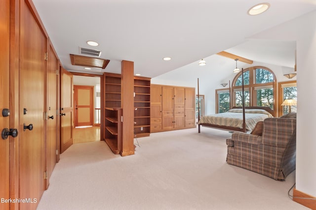 carpeted bedroom with vaulted ceiling