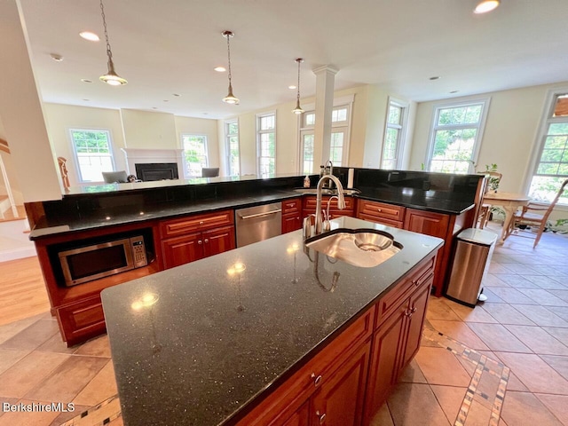 121 E Dugway Rd, Lenox, MA 01240 - kitchen with stainless steel appliances, a large island, recessed lighting, open floor plan, and a fireplace