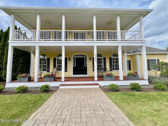121 E Dugway Rd, Lenox, MA 01240 - view of front facade with a balcony, ceiling fan, and a porch