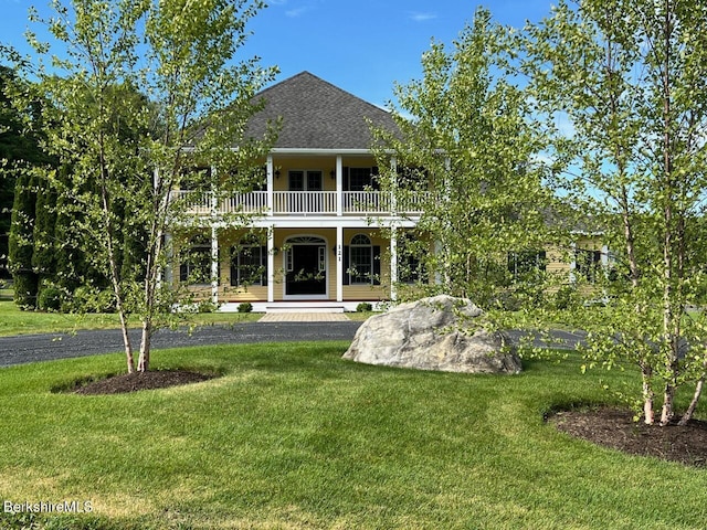 121 E Dugway Rd, Lenox, MA 01240 - back of property with a balcony, a yard, and a shingled roof
