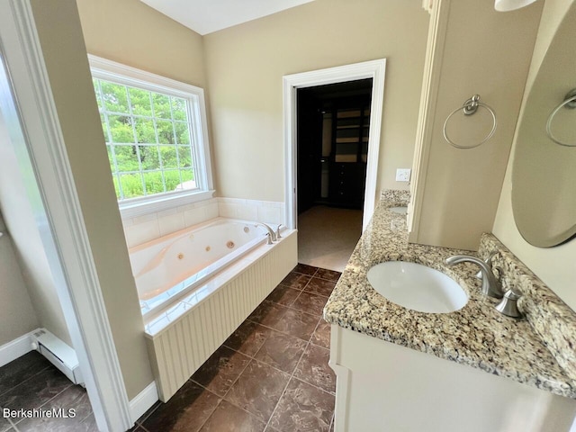 121 E Dugway Rd, Lenox, MA 01240 - bathroom featuring double vanity, a tub with jets, and baseboard heating