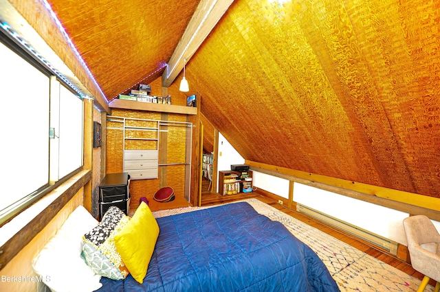 bedroom featuring vaulted ceiling with beams, wood ceiling, multiple windows, wood finished floors, and a baseboard radiator