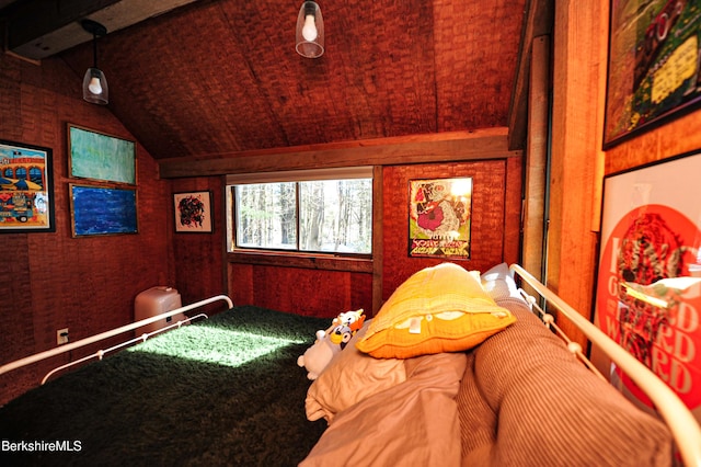 bedroom with lofted ceiling