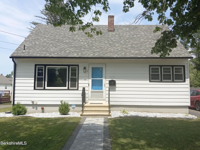 17 Crane Ave, Pittsfield, MA 01201 - new england style home with a shingled roof, a chimney, and a front lawn
