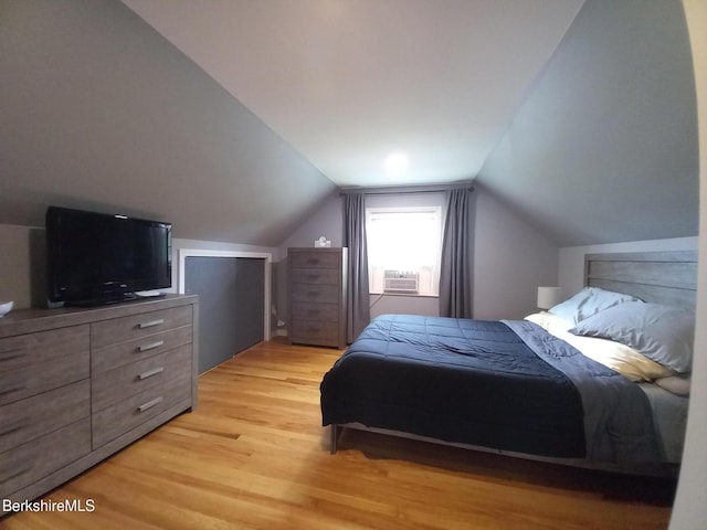 17 Crane Ave, Pittsfield, MA 01201 - bedroom with light wood-style floors, vaulted ceiling, and cooling unit