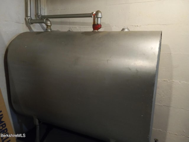 17 Crane Ave, Pittsfield, MA 01201 - basement view of oil tank and concrete block wall