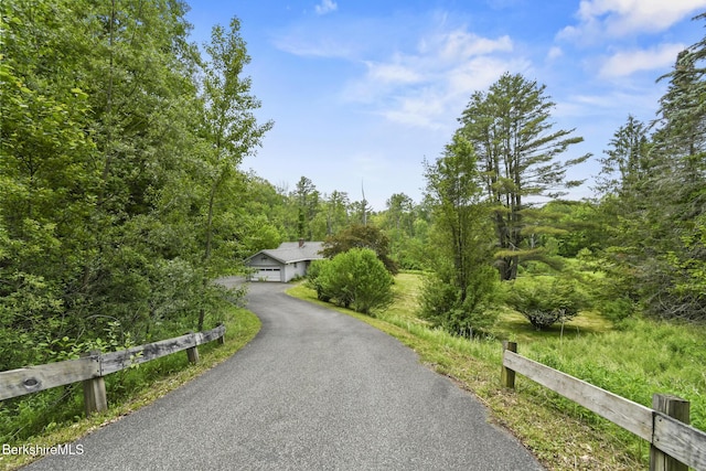 1310 Lenox Rd, Richmond, MA 01254 - view of asphalt driveway featuring a wooded view