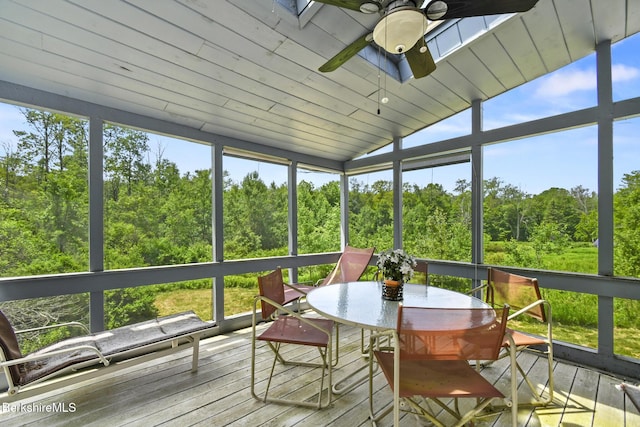 1310 Lenox Rd, Richmond, MA 01254 - sunroom / solarium with ceiling fan, outdoor dining area, vaulted ceiling, and view of wooded area