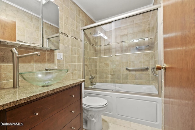 1310 Lenox Rd, Richmond, MA 01254 - bathroom with vanity, tile patterned flooring, bath / shower combo with glass door, tile walls, and tasteful backsplash