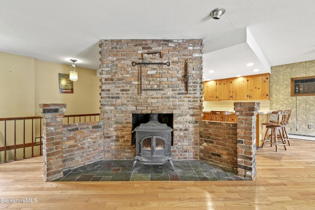 1310 Lenox Rd, Richmond, MA 01254 - living area featuring hardwood / wood-style floors, a wood stove, and recessed lighting