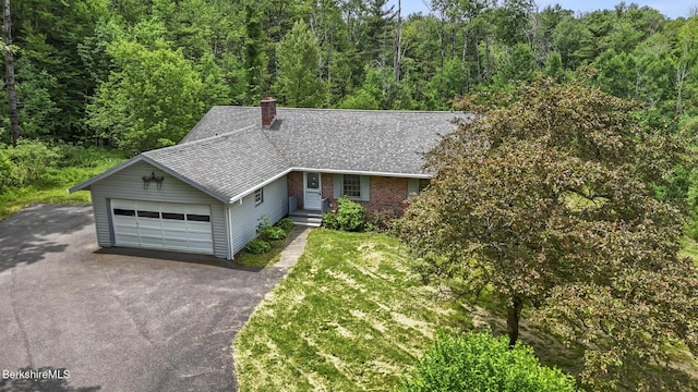 1310 Lenox Rd, Richmond, MA 01254 - ranch-style house featuring driveway, roof with shingles, a chimney, an attached garage, and a view of trees