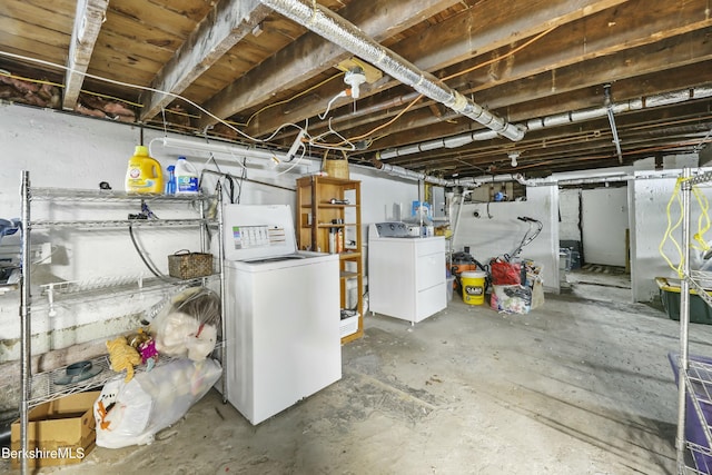 unfinished below grade area with washer and dryer