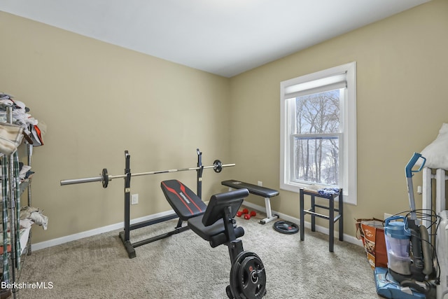 workout area with carpet floors and baseboards