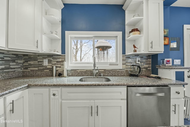 kitchen featuring open shelves, dishwasher, white cabinets, and a sink