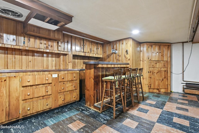 bar with a bar and wood walls