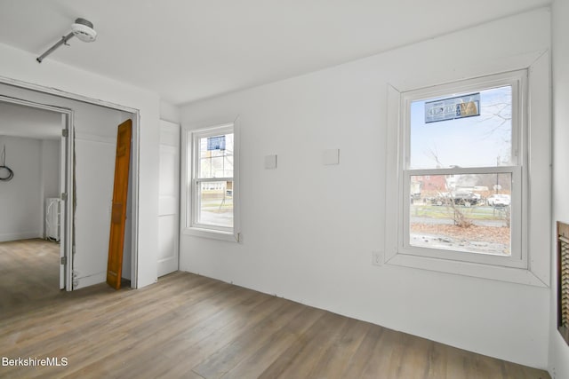 111 Columbia St, Adams, MA 01220 - unfurnished bedroom with light wood finished floors and a closet