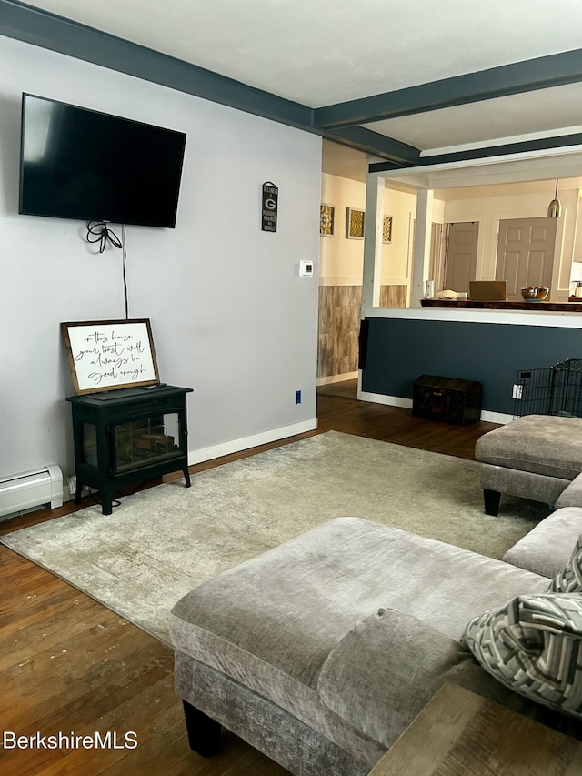 89-91 N Summer St, Adams, MA 01220 - living room featuring a baseboard heating unit, wood finished floors, and beam ceiling