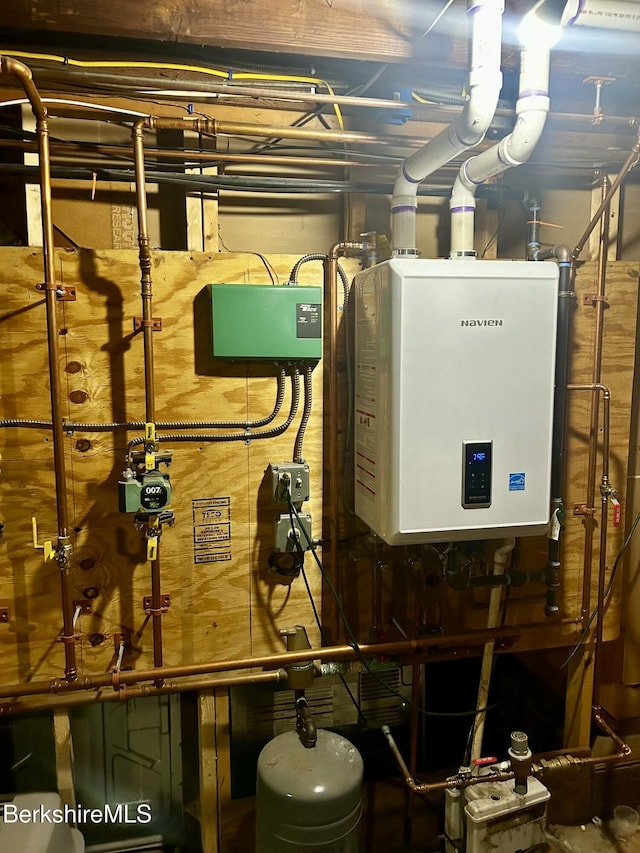89-91 N Summer St, Adams, MA 01220 - utility room featuring tankless water heater