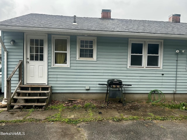 89-91 N Summer St, Adams, MA 01220 - back of house featuring entry steps, a chimney, and roof with shingles