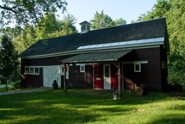 221 Bulkley St, Williamstown, MA 01267 - view of front facade with a front yard and a garage