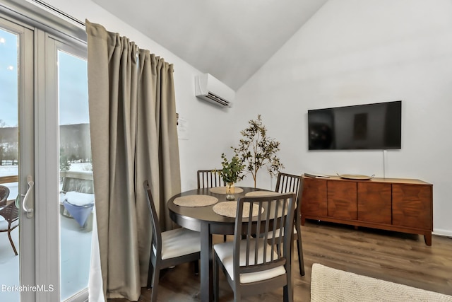 dining space featuring lofted ceiling, dark hardwood / wood-style flooring, and an AC wall unit