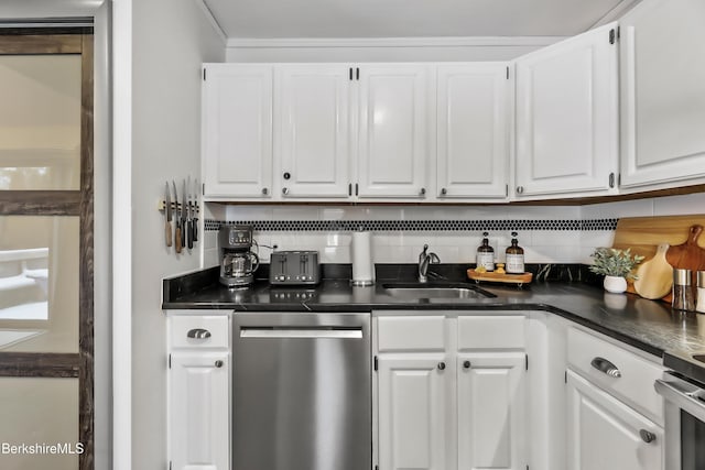 kitchen with backsplash, stainless steel dishwasher, sink, and white cabinets