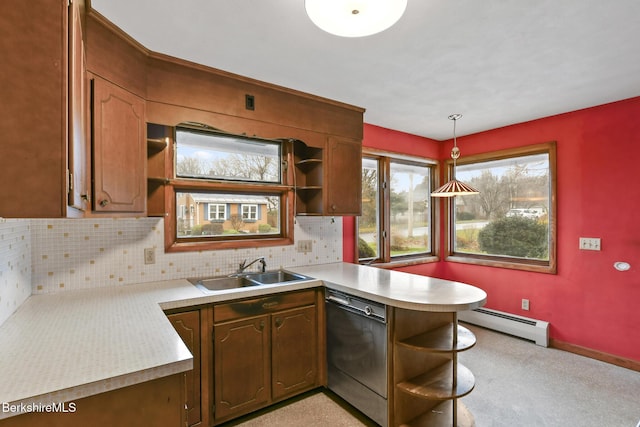 kitchen with pendant lighting, sink, black dishwasher, tasteful backsplash, and a baseboard radiator