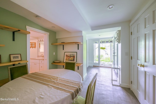 2 Wallace Rd Dh-B, Unit Dh-B Stockbridge, MA 01262 - bedroom with access to exterior, light wood-style flooring, and ensuite bathroom