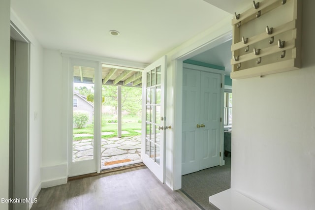 2 Wallace Rd Dh-B, Unit Dh-B Stockbridge, MA 01262 - doorway to outside with wood finished floors and baseboards