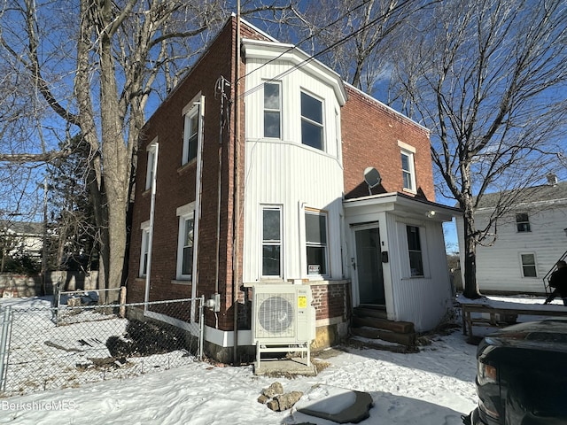 view of front facade with ac unit