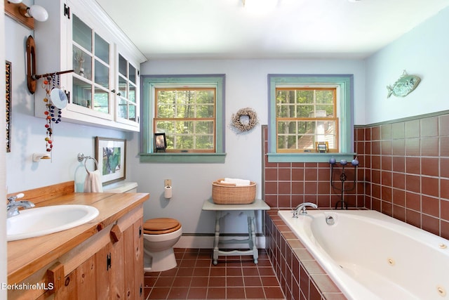 662 Foley Rd, Sheffield, MA 01257 - bathroom featuring a tub with jets, vanity, and tile patterned flooring