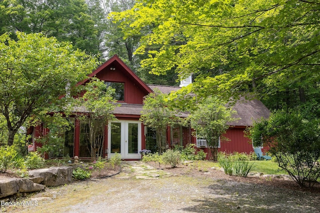662 Foley Rd, Sheffield, MA 01257 - view of front of house featuring roof with shingles, a chimney, and french doors