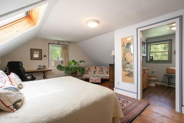 662 Foley Rd, Sheffield, MA 01257 - bedroom with wood finished floors, ensuite bathroom, and vaulted ceiling