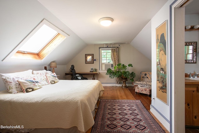 662 Foley Rd, Sheffield, MA 01257 - bedroom with a skylight, wood finished floors, lofted ceiling, and cooling unit