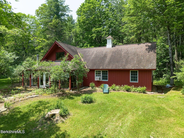 662 Foley Rd, Sheffield, MA 01257 - view of front of home with a front yard, a shingled roof, and a chimney