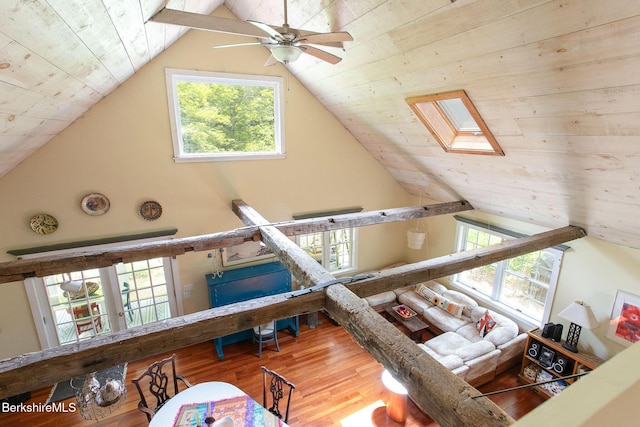 662 Foley Rd, Sheffield, MA 01257 - living room with ceiling fan, wooden ceiling, vaulted ceiling, wood finished floors, and a skylight